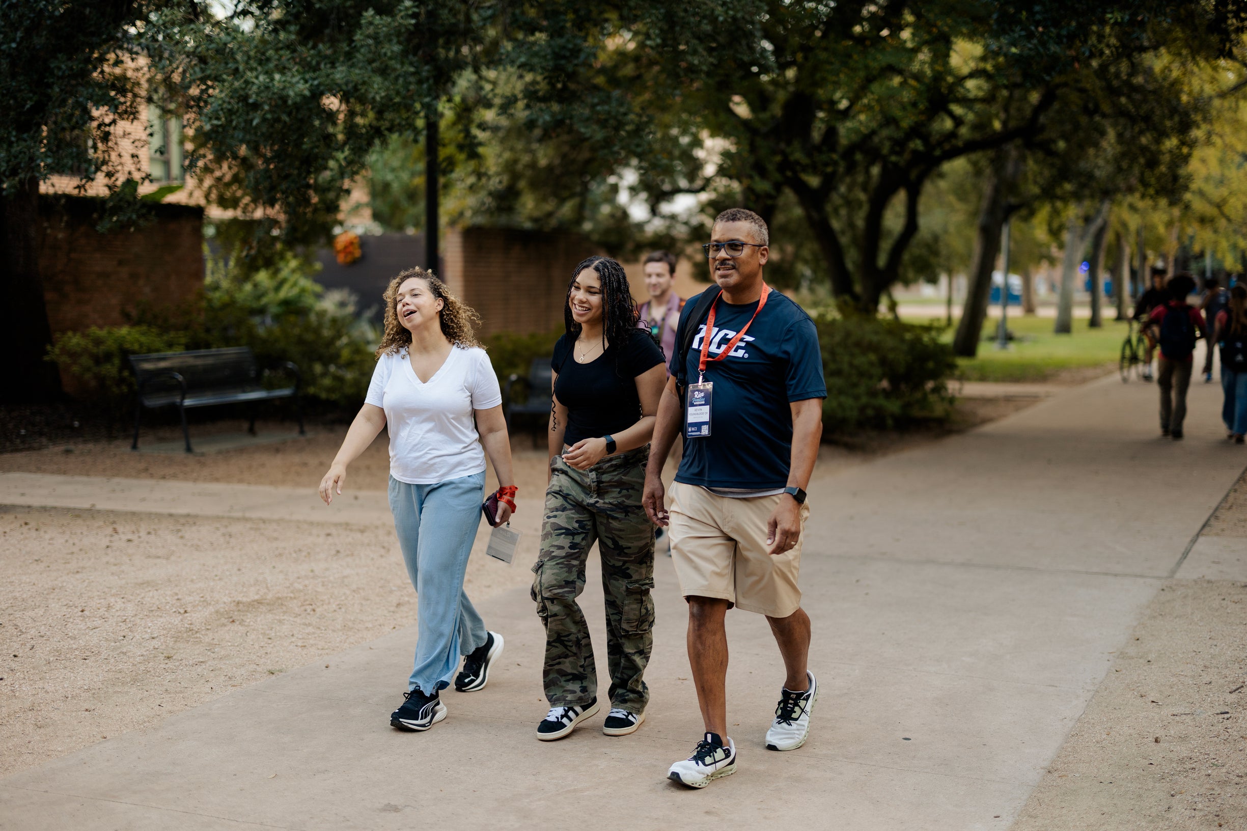 Family walking on campus